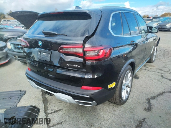 2022 BMW X5 xDrive45e with VIN 5UXTA6C01N9M84108, listed as a Copart auction lot 65150782 with 5,977 mi miles. Bid and sale history available at carsss.com. Image 4.