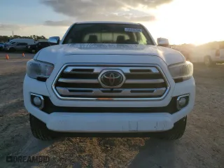 2018 Toyota Tacoma Limited with VIN 5TFEZ5CNXJX058903, listed as a Copart auction lot 82436764 with 76,189 mi miles and Salvage Title. Bid and sale history available at carsss.com. Image 5.
