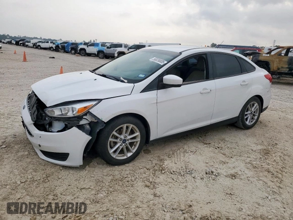 2018 Ford Focus SE with VIN 1FADP3F23JL246375, listed as a Copart auction lot 56539005 with 83,130 mi miles and Salvage title. Bid and sale history available at DreamBid. Image 1.