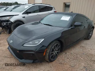 2023 Toyota 86 z VIN JF1ZNBB1XP9760765, wystawiony jako IAAI lot #41754213 z przebiegiem 30 269 mil mil oraz . Historia ofert i sprzedaży dostępna na DreamBid. Obrazek 2.