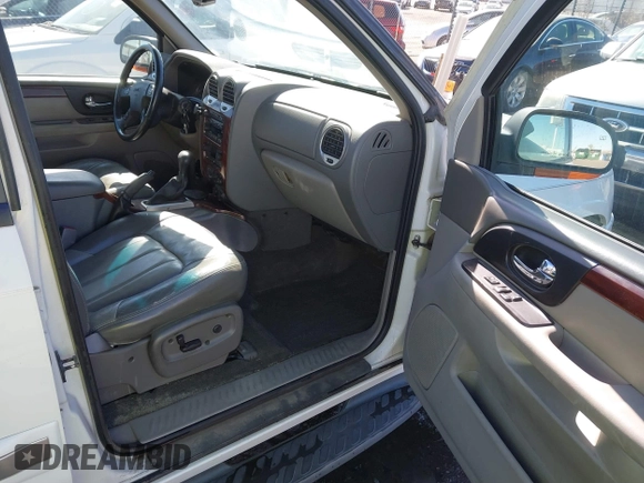 2002 GMC Envoy SLT z VIN 1GKDT13S722281544, wystawiony jako IAAI lot #41837068 z przebiegiem 130 994 mil mil oraz . Historia ofert i sprzedaży dostępna na DreamBid. Obrazek 5.