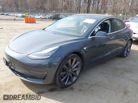 2018 Tesla Model 3 Long Range Battery with VIN 5YJ3E1EB5JF063077, listed as a IAAI auction lot 41773551 with 99,477 mi miles and . Bid and sale history available at DreamBid. Image 17.