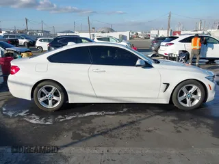 2014 BMW 4 Series 428i with VIN WBA3N7C50EF718812, listed as a IAAI auction lot 41349128 with 67,581 mi miles and . Bid and sale history available at carsss.com. Image 13.