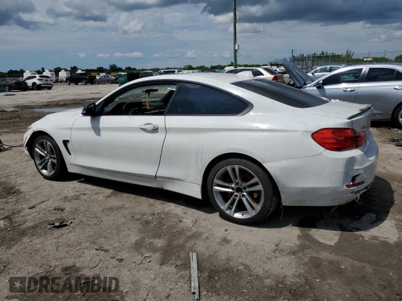 2014 BMW 4 Series 428i xDrive with VIN WBA3N5C52EK197054, listed as a Copart auction lot 71804204 with 168,035 mi miles and Salvage title. Bid and sale history available at DreamBid. Image 2.