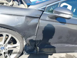 2015 Ford Fusion Titanium with VIN 3FA6P0D99FR258028, listed as a IAAI auction lot 41700630 with 82,084 mi miles. Bid and sale history available at carsss.com. Image 17.
