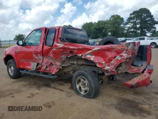 1999 Ford F-150 XL z VIN 1FTRX18L8XKC14644, wystawiony jako Copart lot #53959095 z przebiegiem Nie podano mil oraz Szkoda całkowita • Salvage title. Historia ofert i sprzedaży dostępna na DreamBid. Obrazek 2.