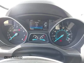2016 Ford Escape SE with VIN 1FMCU0GX7GUB72822, listed as a IAAI auction lot 42136764 with 98,497 mi miles. Bid and sale history available at carsss.com. Image 7.