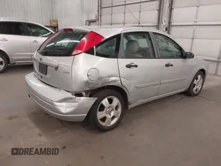 2005 Ford Focus S with VIN 3FAFP37N15R138393, listed as a IAAI auction lot 42106817 with 144,047 mi miles and . Bid and sale history available at carsss.com. Image 4.