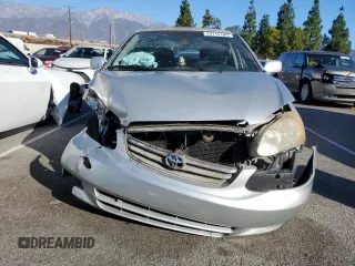 2003 Toyota Corolla CE with VIN 1NXBR32E13Z155142, listed as a Copart auction lot 79714184 with 299,999 mi miles and Salvage Title. Bid and sale history available at DreamBid. Image 5.