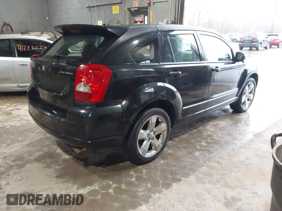 2011 Dodge Caliber Rush with VIN 1B3CB8HB5BD108767, listed as a IAAI auction lot 41820107 with 145,101 mi miles. Bid and sale history available at carsss.com. Image 4.