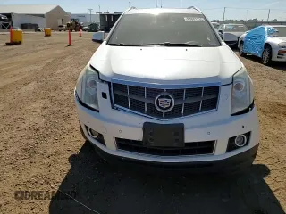 2012 Cadillac SRX Premium Collection с VIN 3GYFNFE30CS534835, выставлен на аукционе Copart как лот 63681235 с пробегом 124 964 миль миль и Списание • Salvage title. История ставок и продаж доступна на DreamBid. Изображение 15.