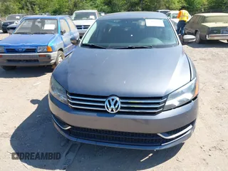 2012 Volkswagen Passat S w/Appearance with VIN 1VWAH7A37CC080086, listed as a IAAI auction lot 42064603 with 188,256 mi miles. Bid and sale history available at carsss.com. Image 6.