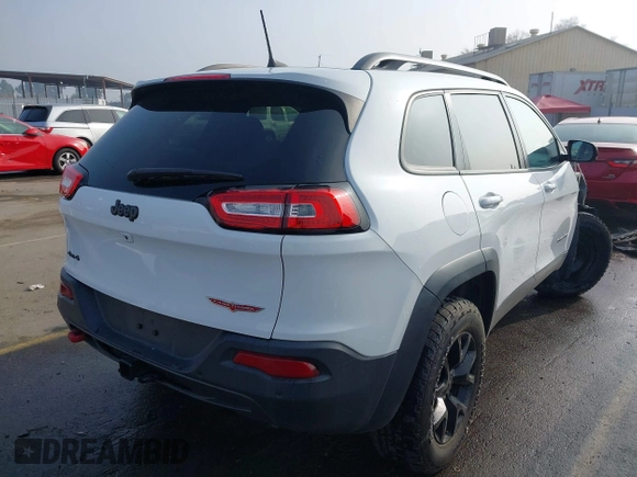2018 Jeep Cherokee Trailhawk z VIN 1C4PJMBX8JD525945, wystawiony jako IAAI lot #41008604 z przebiegiem 111 086 mil mil oraz . Historia ofert i sprzedaży dostępna na DreamBid. Obrazek 4.