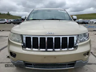 2011 Jeep Grand Cherokee Limited z VIN 1J4RR5GT1BC590599, wystawiony jako Copart lot #58657915 z przebiegiem 103 897 mil mil oraz Czysty tytuł • Clean title. Historia ofert i sprzedaży dostępna na DreamBid. Obrazek 5.