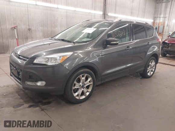2015 Ford Escape Titanium with VIN 1FMCU9J96FUA43337, listed as a IAAI auction lot 41825328 with 149,639 mi miles and . Bid and sale history available at DreamBid. Image 2.