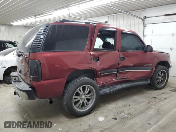 2002 Chevrolet Tahoe LS with VIN 1GNEC13T02R228644, listed as a Copart auction lot 55672545 with 245,005 mi miles and Non repairable. Bid and sale history available at DreamBid. Image 3.