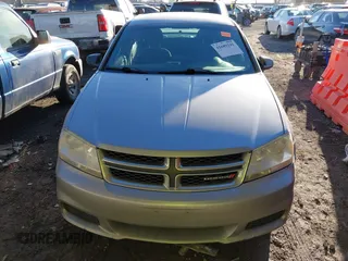 2013 Dodge Avenger SE with VIN 1C3CDZAB4DN590562, listed as a IAAI auction lot 41689241 with 258,167 mi miles and . Bid and sale history available at carsss.com. Image 12.