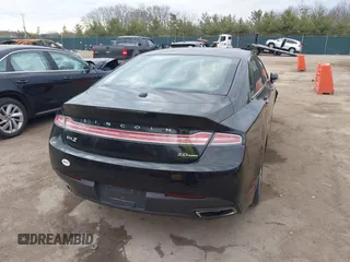 2014 Lincoln MKZ with VIN 3LN6L2G90ER832698, listed as a IAAI auction lot 41887879 with 141,798 mi miles and . Bid and sale history available at DreamBid. Image 4.