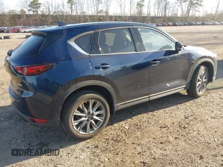 2020 Mazda CX-5 Grand Touring with VIN JM3KFBDM4L0779284, listed as a IAAI auction lot 42060936 with 9,227 mi miles. Bid and sale history available at carsss.com. Image 4.