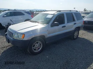 2004 Jeep Grand Cherokee Laredo z VIN 1J4GW48S34C272700, wystawiony jako IAAI lot #42494918 z przebiegiem 214 843 mil mil oraz . Historia ofert i sprzedaży dostępna na DreamBid. Obrazek 2.