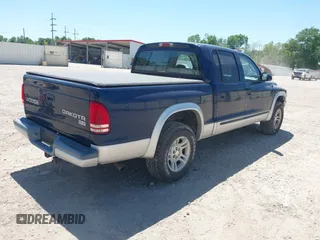 2003 Dodge Dakota SLT with VIN 1D7HL48N63S158682, listed as a IAAI auction lot 41964332 with 278,390 mi miles. Bid and sale history available at carsss.com. Image 4.
