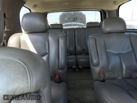 2004 Chevrolet Tahoe LT with VIN 1GNEC13ZX4R306385, listed as a Copart auction lot 75694864 with 168,142 mi miles and Salvage Title. Bid and sale history available at carsss.com. Image 10.