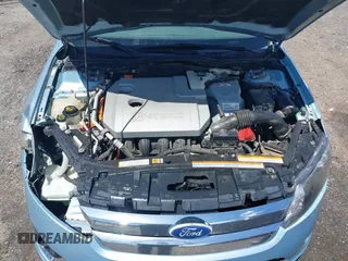 2010 Ford Fusion Hybrid z VIN 3FADP0L33AR385001, wystawiony jako IAAI lot #42074965 z przebiegiem 195 962 mil mil oraz . Historia ofert i sprzedaży dostępna na DreamBid. Obrazek 10.