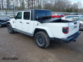 2020 Jeep Gladiator Overland with VIN 1C6HJTFG1LL107641, listed as a IAAI auction lot 41847586 with 69,664 mi miles. Bid and sale history available at carsss.com. Image 3.
