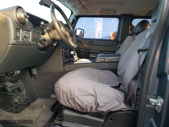 2005 Hummer H2 SUT with VIN 5GRGN22U15H125141, listed as a Copart auction lot 74180754 with 0 mi miles and Salvage Title. Bid and sale history available at carsss.com. Image 7.