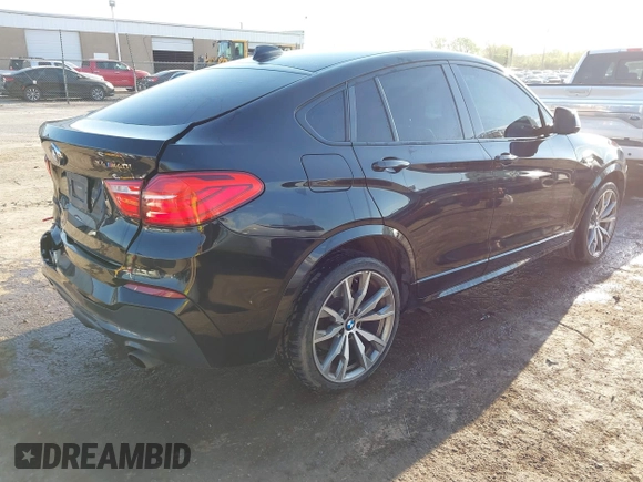 2016 BMW X4 M40i z VIN 5UXXW7C59G0M91223, wystawiony jako IAAI lot #42009394 z przebiegiem 144 771 mil mil oraz . Historia ofert i sprzedaży dostępna na DreamBid. Obrazek 4.