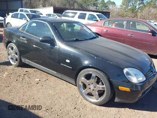 2000 Mercedes-Benz SLK-Class Kompressor with VIN WDBKK47F6YF149668, listed as a IAAI auction lot 41669394 with 1 mi miles. Bid and sale history available at carsss.com. Image 1.
