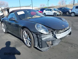 2012 Porsche 911 Carrera S z VIN WP0CB2A98CS154934, wystawiony jako IAAI lot #41871101 z przebiegiem 69 411 mil mil oraz . Historia ofert i sprzedaży dostępna na DreamBid. Obrazek 1.