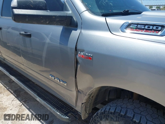 2022 Ram 2500 Tradesman z VIN 3C6UR5HJ7NG387674, wystawiony jako IAAI lot #42189557 z przebiegiem 125 045 mil mil oraz . Historia ofert i sprzedaży dostępna na DreamBid. Obrazek 6.