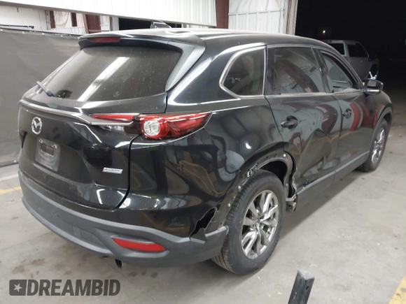 2018 Mazda CX-9 Touring with VIN JM3TCACY9J0213310, listed as a IAAI auction lot 42047663 with 78,409 mi miles and . Bid and sale history available at carsss.com. Image 4.