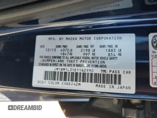 2014 Mazda 3 S Touring with VIN JM1BM1L31E1162990, listed as a Copart auction lot 51667034 with 92,255 mi miles and Salvage Title. Bid and sale history available at DreamBid. Image 14.