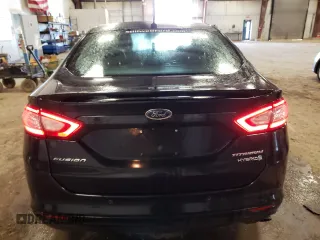 2014 Ford Fusion Titanium Hybrid z VIN 3FA6P0RUXER168706, wystawiony jako Copart lot #55362295 z przebiegiem 136 382 mil mil oraz Czysty tytuł • Clean title. Historia ofert i sprzedaży dostępna na DreamBid. Obrazek 6.