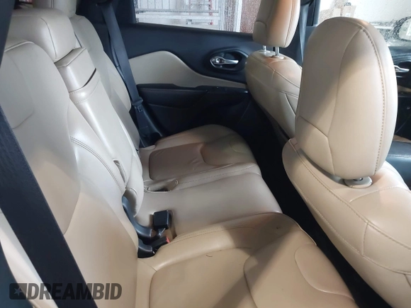 2016 Jeep Cherokee Limited z VIN 1C4PJLDB6GW355058, wystawiony jako IAAI lot #42231943 z przebiegiem 124 656 mil mil oraz . Historia ofert i sprzedaży dostępna na DreamBid. Obrazek 8.