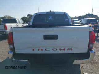 2018 Toyota Tacoma SR with VIN 5TFAX5GN2JX128621, listed as a IAAI auction lot 41797514 with 216,251 mi miles and . Bid and sale history available at DreamBid. Image 16.