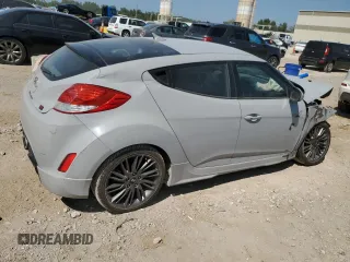2013 Hyundai Veloster w/Gray Int with VIN KMHTC6AD0DU126717, listed as a Copart auction lot 65536944 with 89,662 mi miles and Salvage title. Bid and sale history available at DreamBid. Image 3.
