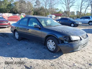 2001 Toyota Camry CE with VIN 4T1BG22K41U842473, listed as a IAAI auction lot 41858322 with 203,696 mi miles. Bid and sale history available at carsss.com. Image 1.