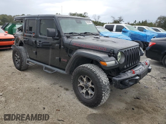 2019 Jeep Wrangler Unlimited Rubicon with VIN 1C4HJXFN6KW665805, listed as a Copart auction lot 45424005 with 141,007 mi miles and Salvage title. Bid and sale history available at DreamBid. Image 4.