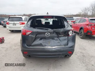 2015 Mazda CX-5 Touring with VIN JM3KE4CY1F0439016, listed as a IAAI auction lot 42039259 with 201,325 mi miles and . Bid and sale history available at carsss.com. Image 16.