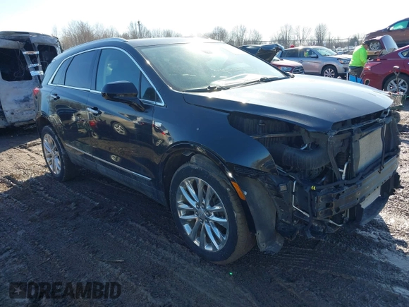 2019 Cadillac XT5 Premium Luxury AWD z VIN 1GYKNFRS1KZ250468, wystawiony jako IAAI lot #41764152 z przebiegiem 107 918 mil mil oraz . Historia ofert i sprzedaży dostępna na DreamBid. Obrazek 1.