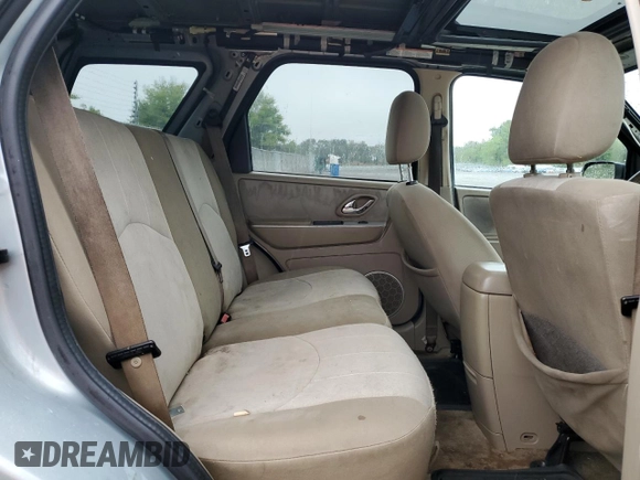 2005 Mercury Mariner Luxury z VIN 4M2CU56185DJ12005, wystawiony jako Copart lot #73570914 z przebiegiem 185 354 mil mil oraz Tytuł czysty. Historia ofert i sprzedaży dostępna na DreamBid. Obrazek 11.