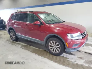 2018 Volkswagen Tiguan SEL with VIN 3VV3B7AX0JM124135, listed as a Copart auction lot 60721155 with 98,247 mi miles and Salvage title. Bid and sale history available at DreamBid. Image 4.