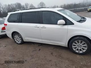 2011 Toyota Sienna XLE with VIN 5TDDK3DC8BS010051, listed as a IAAI auction lot 41405424 with 293,348 mi miles. Bid and sale history available at carsss.com. Image 13.