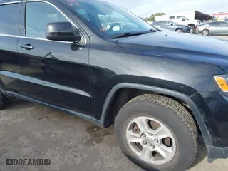 2014 Jeep Grand Cherokee Laredo with VIN 1C4RJFAG9EC516138, listed as a IAAI auction lot 42055214 with 135,701 mi miles. Bid and sale history available at carsss.com. Image 6.