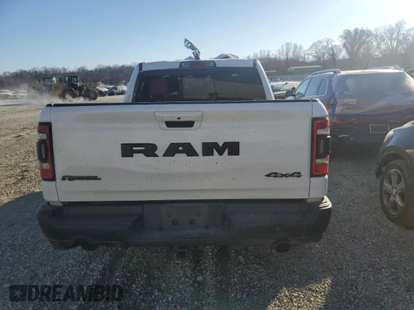 2019 Ram 1500 Rebel z VIN 1C6SRFLT8KN780527, wystawiony jako Copart lot #47611955 z przebiegiem Nie podano mil oraz Szkoda całkowita • Salvage title. Historia ofert i sprzedaży dostępna na DreamBid. Obrazek 6.
