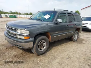 2002 Chevrolet Tahoe LT z VIN 1GNEK13Z42J203185, wystawiony jako IAAI lot #41940552 z przebiegiem 325 618 mil mil oraz . Historia ofert i sprzedaży dostępna na DreamBid. Obrazek 2.