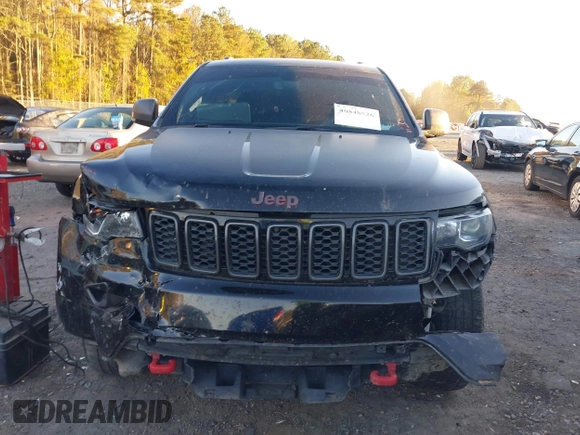 2018 Jeep Grand Cherokee Trailhawk with VIN 1C4RJFLT2JC349450, listed as a IAAI auction lot 40848526 with 139,326 mi miles and . Bid and sale history available at DreamBid. Image 13.